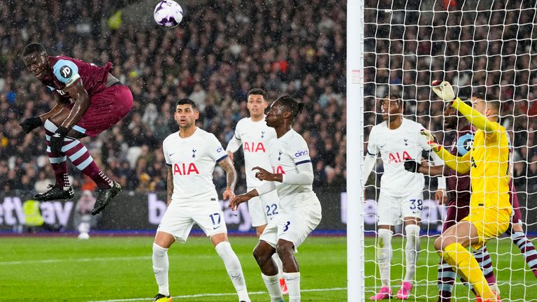 West Ham's Kurt Zouma, left, scores his side's equaliser